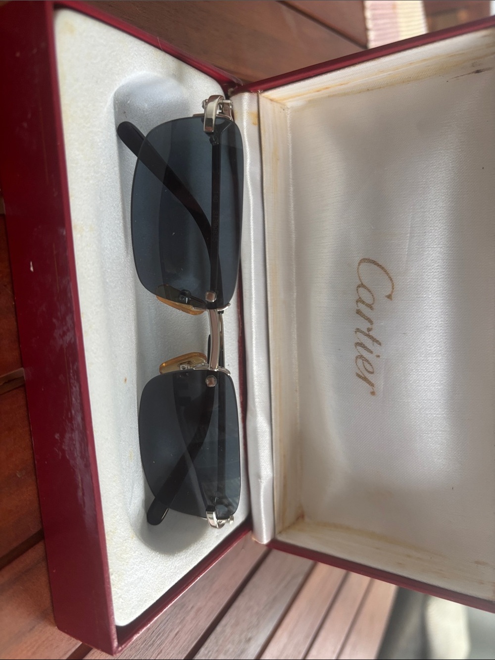 Cartier Men’s Rimless Sunglasses in Black and Gold